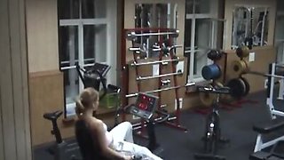 Charming doll exercising naked in the gym!