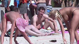 Blonde Lesbians' Public Beach Striptease Ignites Desire