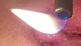 Sexy Shaved Pussy and Clit Teased and Singed with Flame