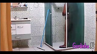 A Camera Catches Naughty Stepmother with Big Breasts and Bikini Marks Cleaning the House