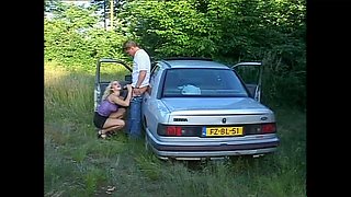 Busty MILF Gets Fucked on the Hood of the Car by a Big Cock That Cums in Her Mouth
