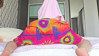 A hijabi girl twerking in slow motion.