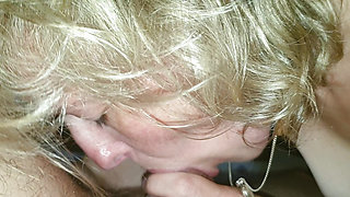 Sucking his cock until he squirts.