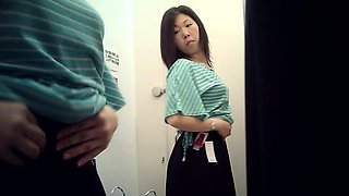 Cute amateur asian web cam girl playing with her toy