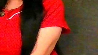 Housewife Smoking in Black Gloves