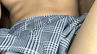 Innocent Girl with a Tender Face Masturbates Her Pussy in a Miniskirt