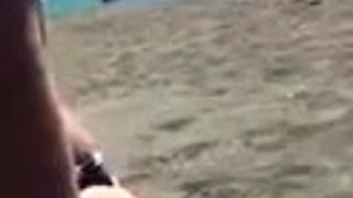 Smoking Latina with Big Tits at an Italian Beach