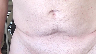 Exhibitionist masturbator testing a new bottle for cock play