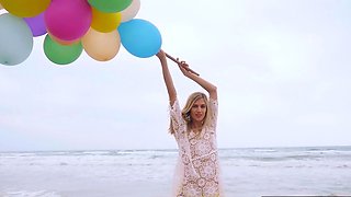 Italian MILF blondie plays with balloons