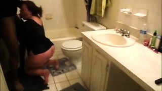 Chubby brunette gets rammed hard doggystyle by a black bull
