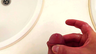 Risky cumshot at the sink in the school toilet