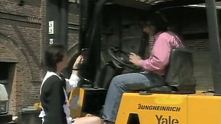 Short haired blonde lady sucking dick of a truck driver