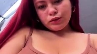 Redheaded fat MILF stripping and masturbating hard