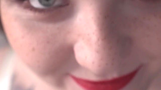 A Girl Is Messing with a Macro Camera