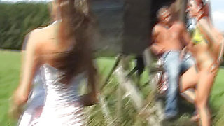 Horny dude fucks two amazing German babes outdoors