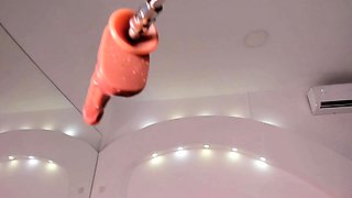 Dripping Wet Beauty Gets Ravished by a Dildo Machine