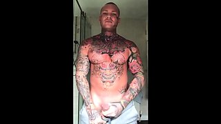 Tattooed Hunk Strokes His Big Cock Alone