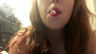 Chubby Redhead Teen Smoking in Black Bikini Top w Black Fingernails