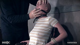 Big tittied skinhead Riley Nixon is tied up and punished by one perverted dude