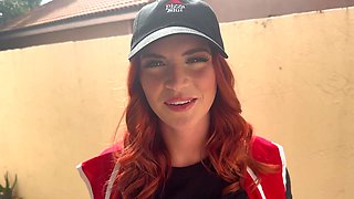 Fiery Redhead Ignites Passion with Untamed Energy