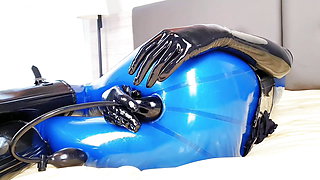 OnlyFans teaser - Anal toys in blue latex catsuit with red integrated vaginal and anal condoms!