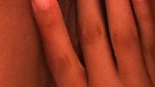 Oiled ebony babe masturbates with her fingers and toy in a close up video