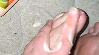 messy putting lotion on my clean chubby feet