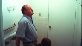 Bathroom slut sucks dick in restroom