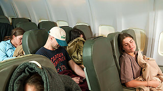 Seductive Brunette Jerks Her Pussy While Flying on a Plane
