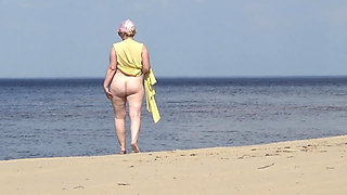 Juicy Woman Walking Naked on Beach