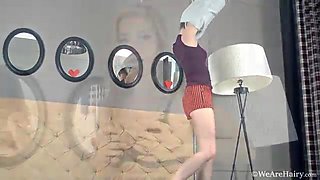 Vanessa V strips on sofa to show off hairy body - WeAreHairy