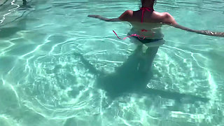 Cum to the pool with me wearing a micro bikini and showing my perfect body