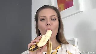 Ewangi has fun with a banana in bed - WeAreHairy