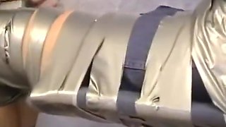 Secretary bound in tape, gagged and blindfold by intruder