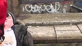 Brunette fucking with old dude next to a railway