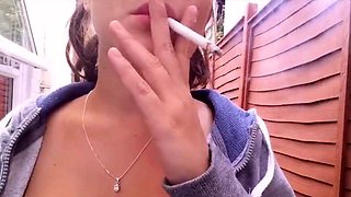 Outdoor Smoking Tease with Big Natural Tits