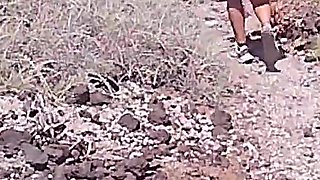 Couple Is Hiking Naked Near the Coast
