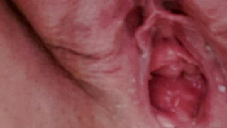 Pissing in close up with open pussy