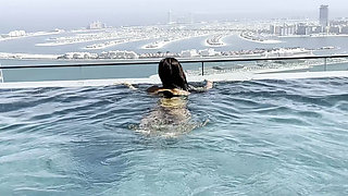 Monika Fox Poses In Bikini & Swims In Pool On Roof Of Hotel