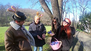 Two beautiful girls have an intense foursome with two guys in the open air