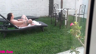 I Recorded My Stepsister Sunbathing Naked and Masturbating in the Garden