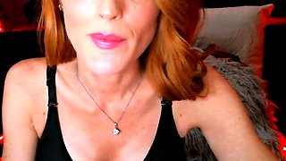 Amateur redhead poses and masturbates with toys