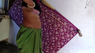 The father-in-law is secretly watching the Indian daughter-in-law cleaning the house in a petticoat, blouse, bra, daughter-in-law is fingering her pussy, yearning for a cock.