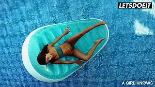 Anya Krey and Megane Lopez get wet and wild in sensual lesbian poolside romp