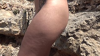 Beautiful and Tanned Girl Sucking a Loaded Dick on a Beach