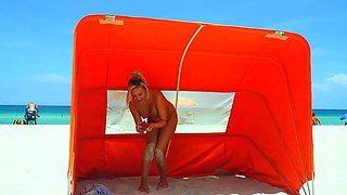 Hot MILF masturbating in car while going to the beach
