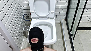 Pissing. Toilet slave. Dominatrix pisses in the mouth and on the body of her slave. Toilet fetish