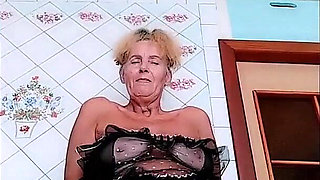 Hot Housewife in the Kitchen After Shower