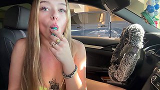 Close-up public pussy masturbation with a buttplug in ass in a car