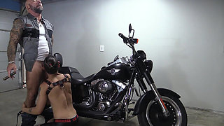 Fucking my submissive on my Harley, cigar smoking!